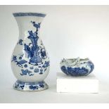 A Chinese blue and white wall pocket of vase shaped form, decorated with objects and prunus blossom,