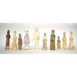 Ten Chinese pottery tomb and other figures, decorated in various glazes, max h. 35 cm, together with