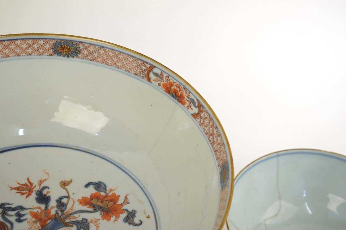 A Chinese bowl centrally decorated with a vase of flowers in the Imari palette, d. 25.5 cm, together - Image 4 of 5