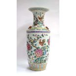 A Cantonese vase of shouldered form decorated in coloured enamels with cockerels and hens within a