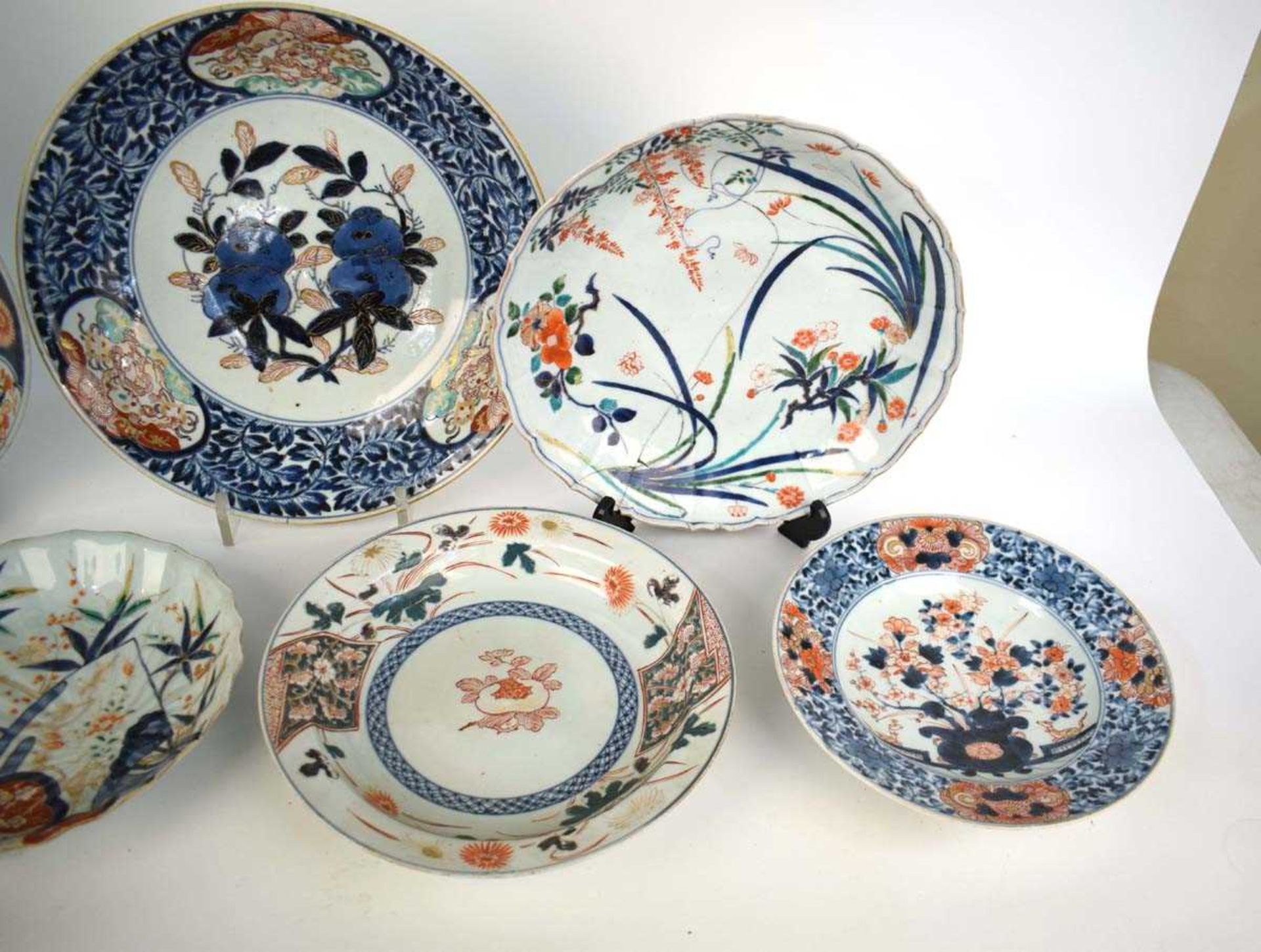 A Japanese charger centrally decorated with persimmon in the imari palette, within a mythical - Image 4 of 9