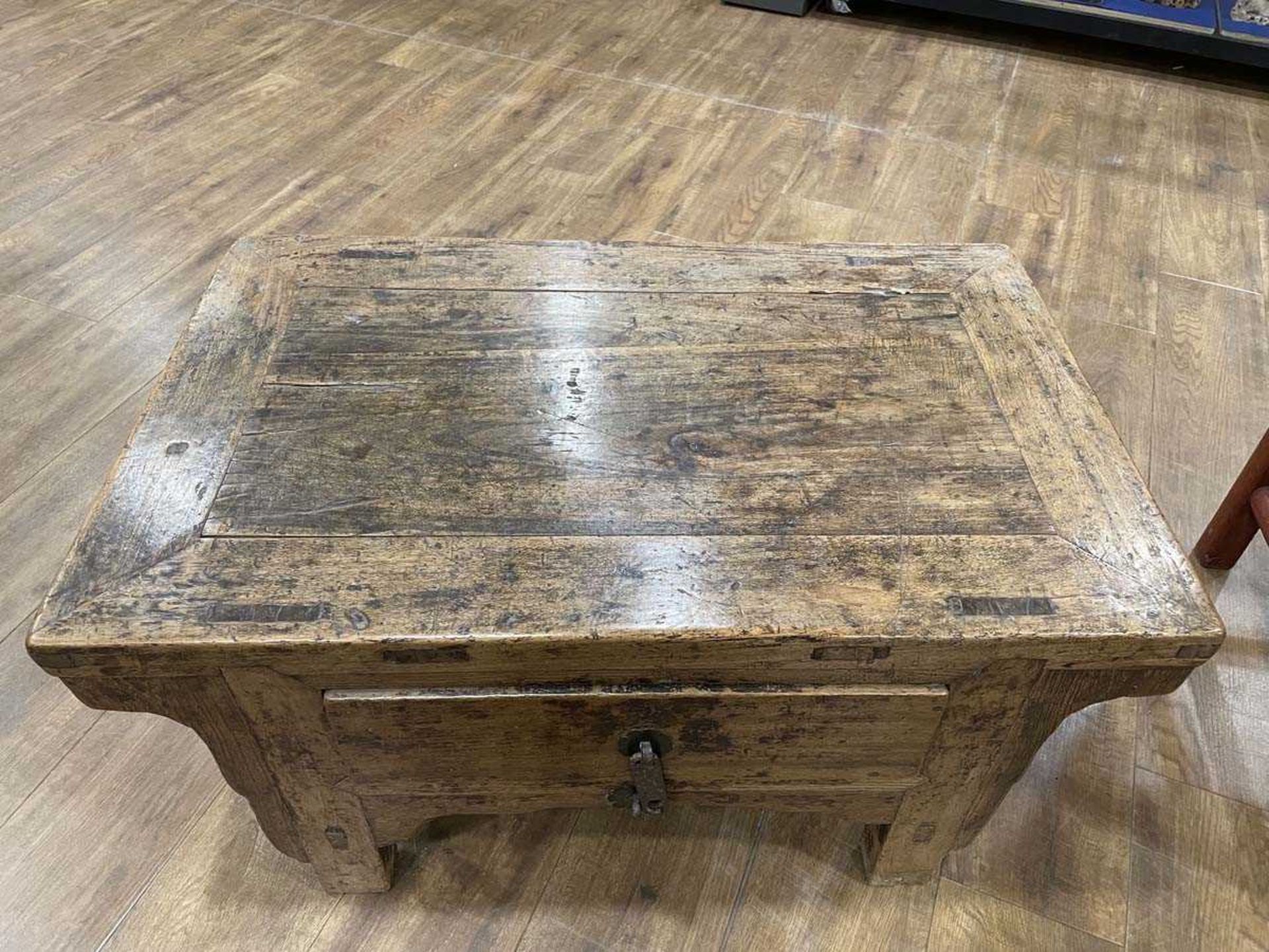 A Chinese low elm side table, the surface over a frieze on four shaped legs, 64 x 35 x 31 cm, - Bild 8 aus 15