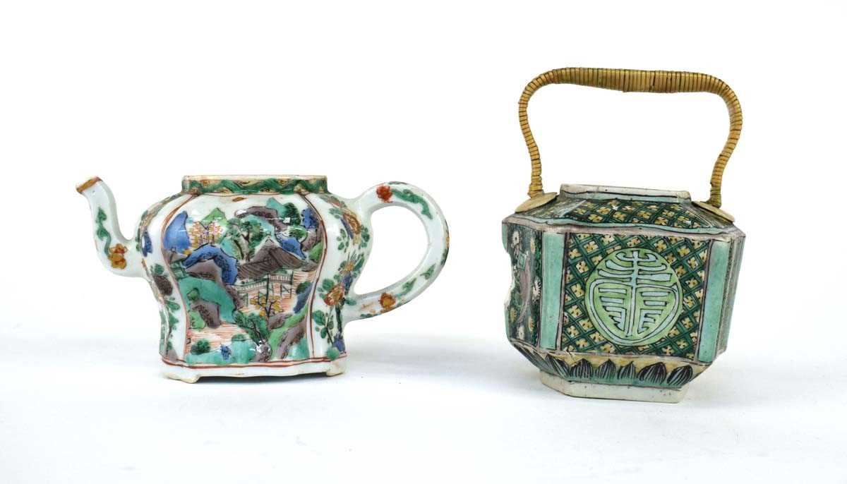 A Chinese famille verte teapot decorated with a mountainous landscape within foliate borders, h. 8