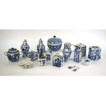 A mixed group of Chinese and other blue and white ceramics including beads, lidded vases, caddies