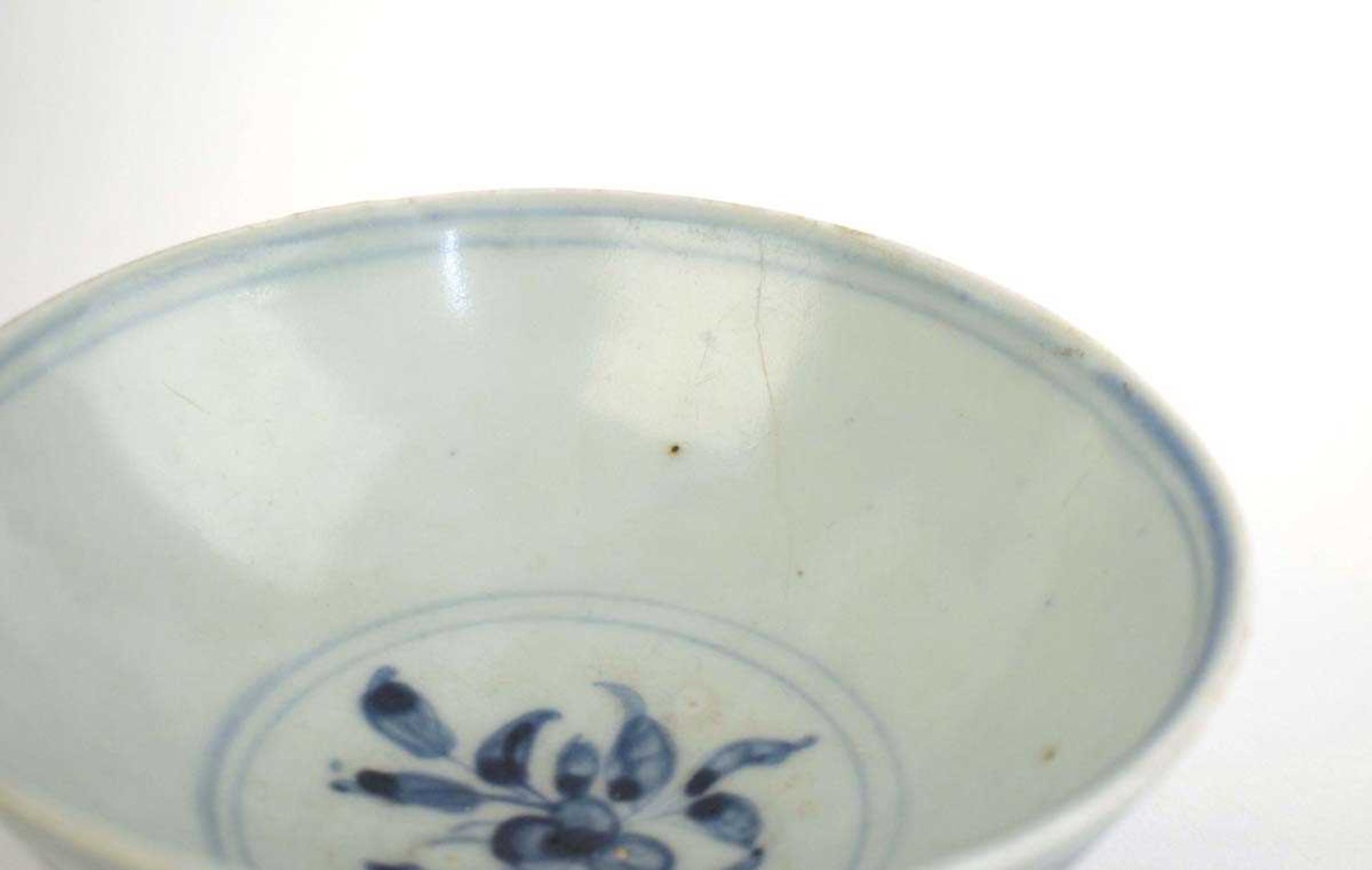 A Chinese blue and white bowl of flared form, externally decorated with scrolls of stylised - Image 2 of 22