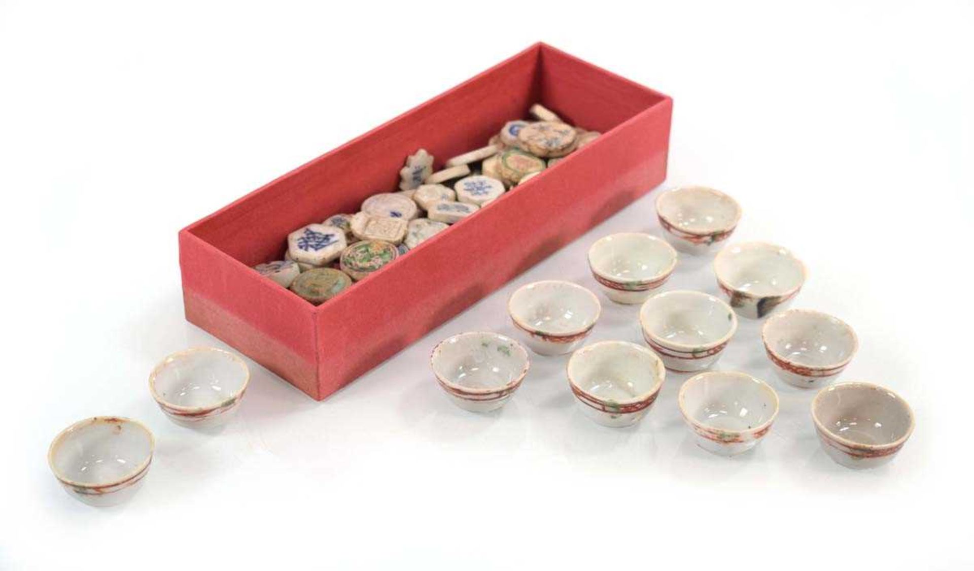 A collection of Chinese porcelain gaming counters/tokens, approx. 60, together with twelve miniature