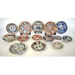 A group of fourteen Japanese imari and other side plates and dishes, max. d. 21.5 cm (14) *from