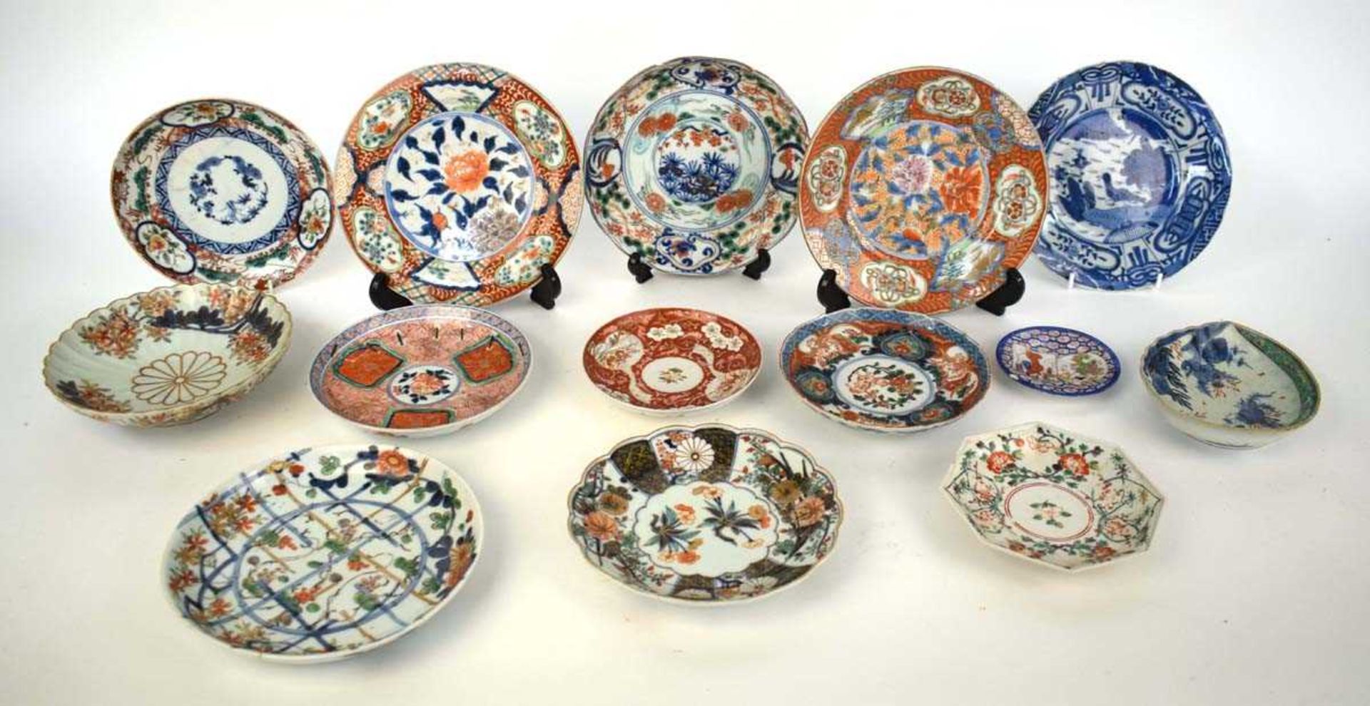 A group of fourteen Japanese imari and other side plates and dishes, max. d. 21.5 cm (14) *from