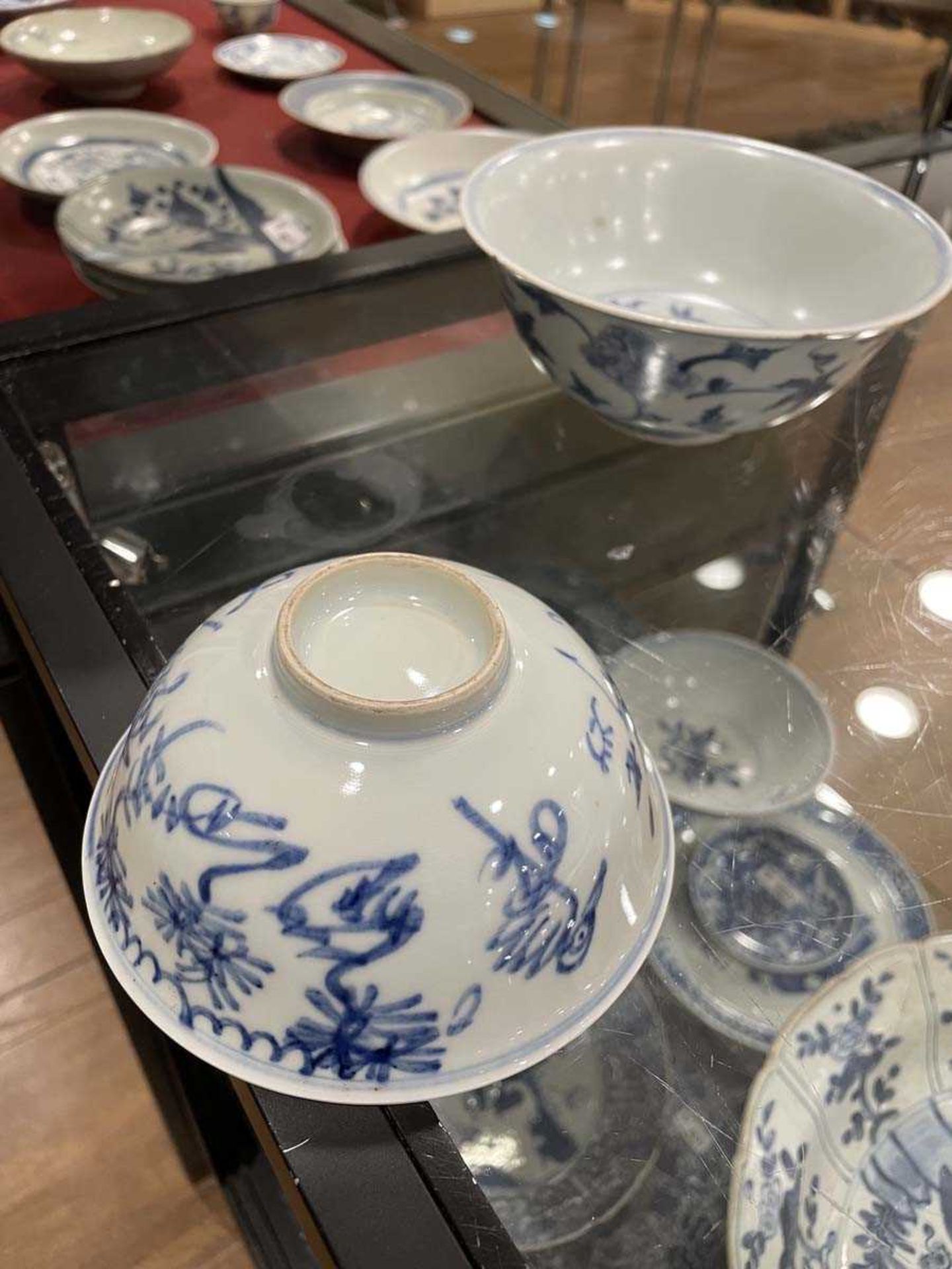 A Chinese blue and white bowl of flared form, externally decorated with scrolls of stylised - Image 20 of 22