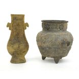 A Chinese archaic pottery arrow vase of typical form, h. 16 cm and a globular vase, relief decorated