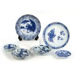 A Chinese blue and white plate centrally decorated with school children and their master within a