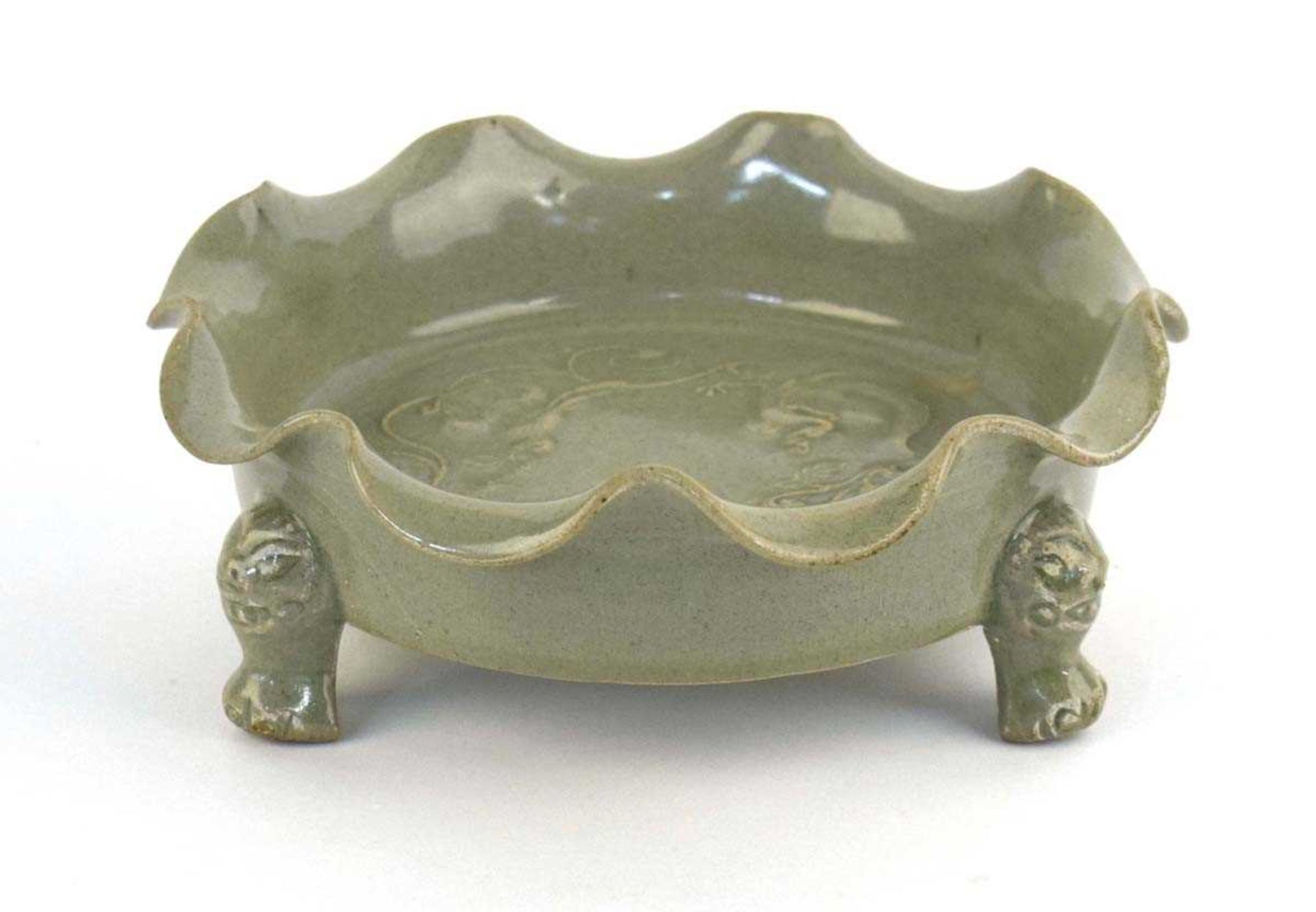 A Chinese celadon dish of scalloped circular form, relief decorated with exotic birds on three - Image 2 of 10