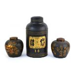 A 19th century Chavney & Co. 'japanned' tea canister of typical form, h. 43 cm, together with a pair