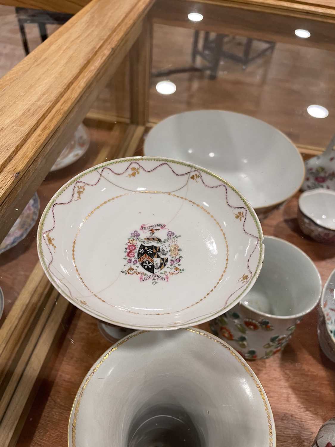 A Chinese Export armorial dish, decorated in coloured enamels with traditional figures and the (?) - Image 28 of 41