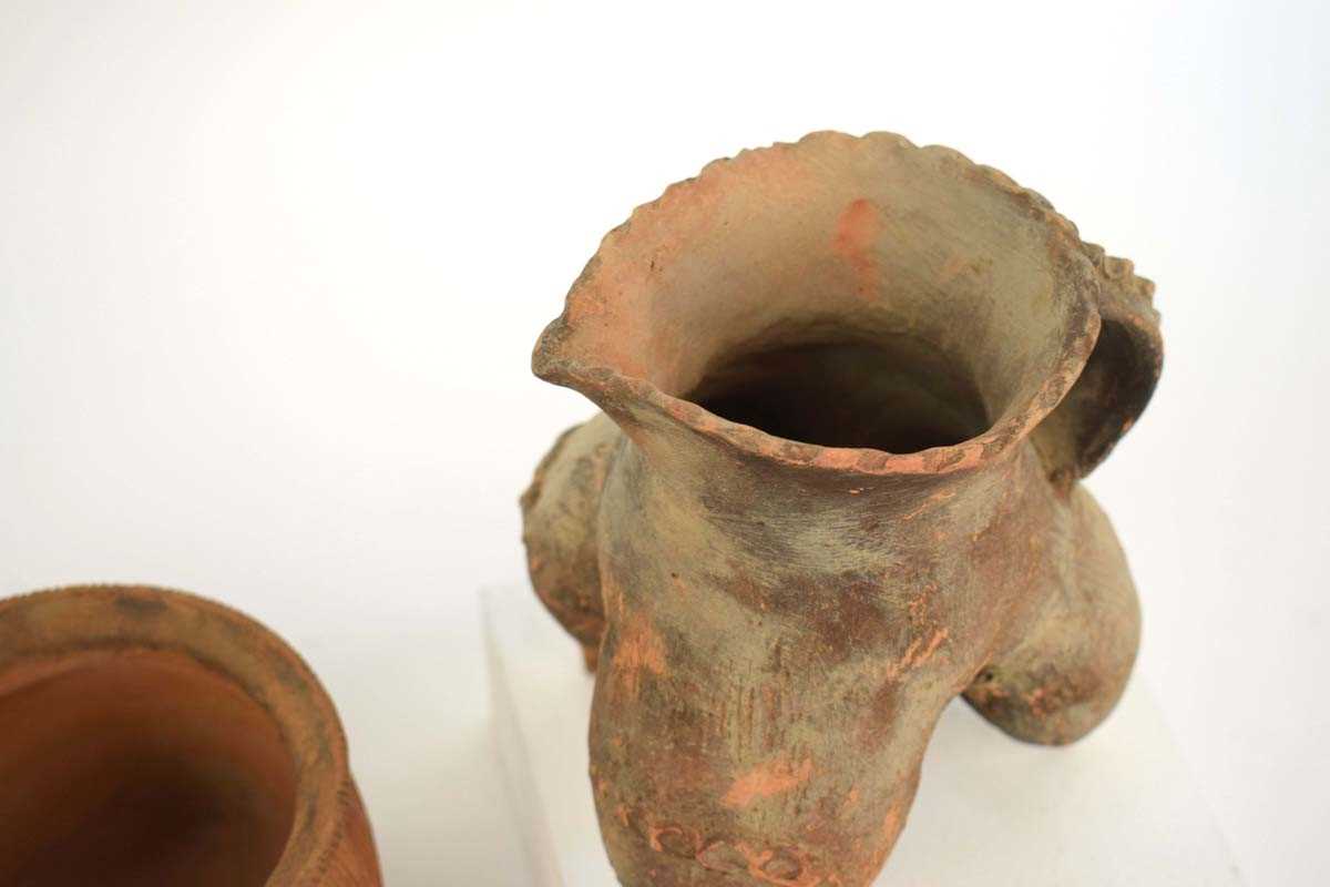 A Chinese archaic pottery jug of tripod form, h. 16 cm, together with three similar vessels (4) * - Image 3 of 28
