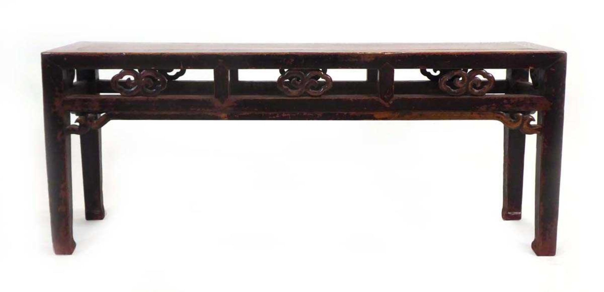 A Chinese hardwood bench of typical form, w. 120 cm, h. 48 cm, d. 32 cm *from the collection of