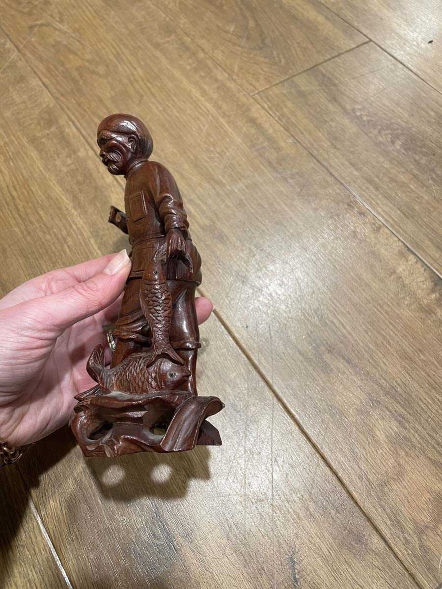 A Chinese carved wood figure modelled as a fisherman and his catch, h. 18 cm, together with ten - Bild 13 aus 62
