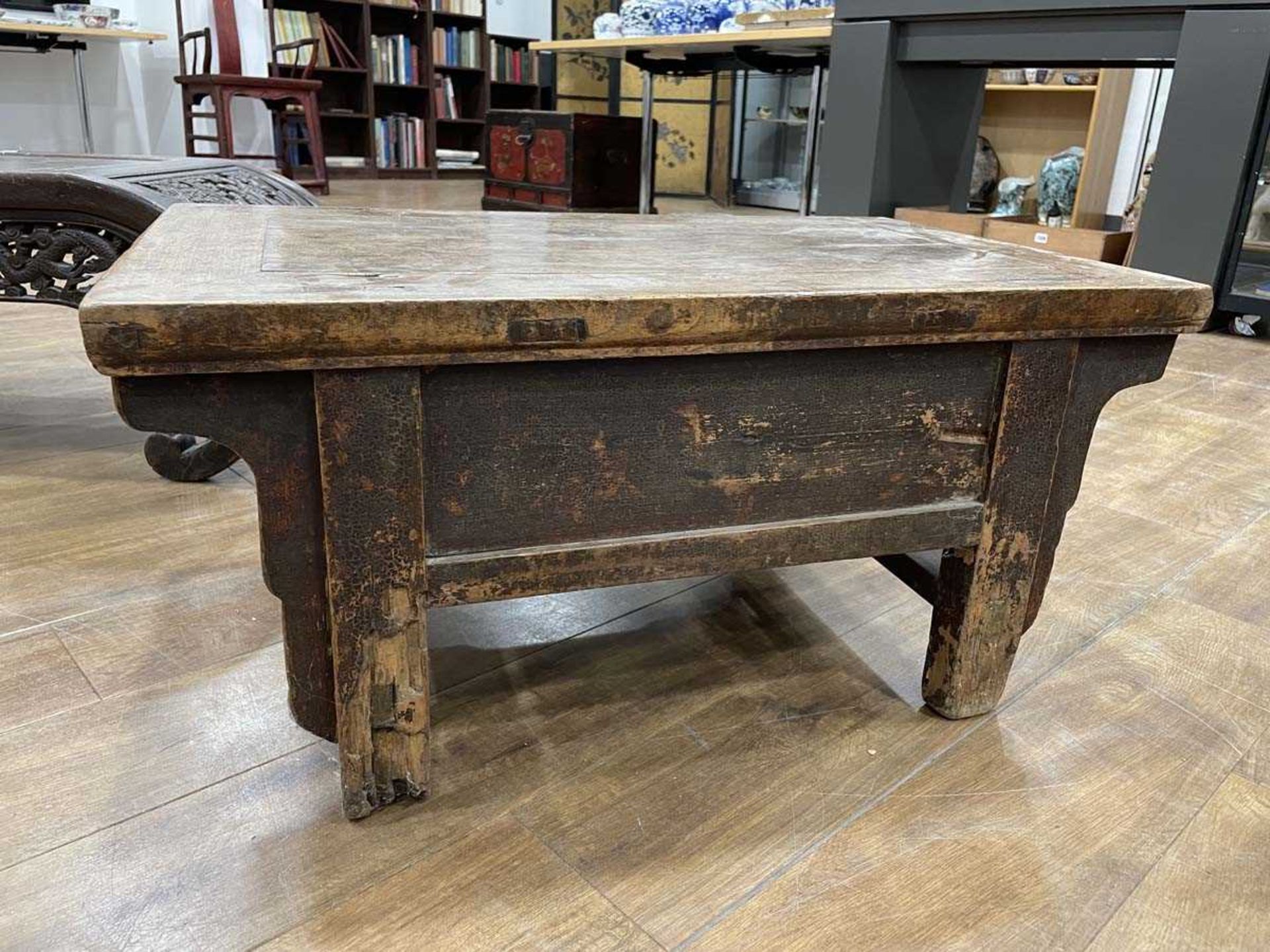 A Chinese low elm side table, the surface over a frieze on four shaped legs, 64 x 35 x 31 cm, - Bild 13 aus 15