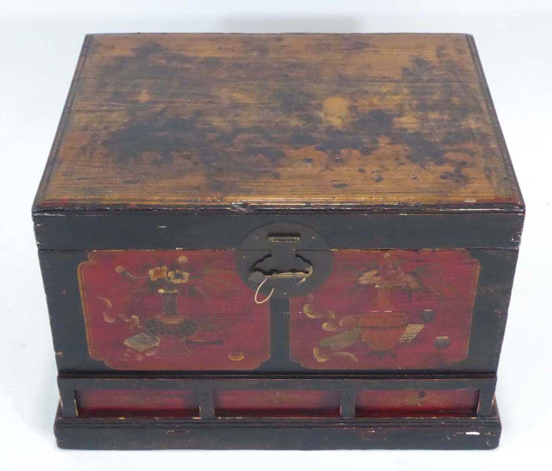 A Chinese lacquered pine chest, the lid opening to reveal a vacant interior, over three faux - Image 2 of 2
