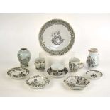 Eleven items of Chinese en-grisaille decorated porcelain including a tea bowl and matching saucer,