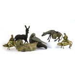 A pair of Chinese brass figures, each modelled as a gentleman seated on a buffalo, max h. 14 cm,