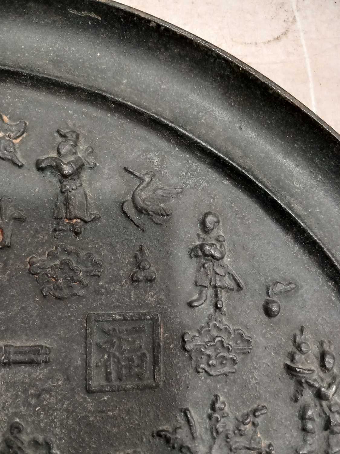 A Chinese Export cast metal 'mirror', relief decorated with figures and characters, d. 40.5 cm, - Image 14 of 25