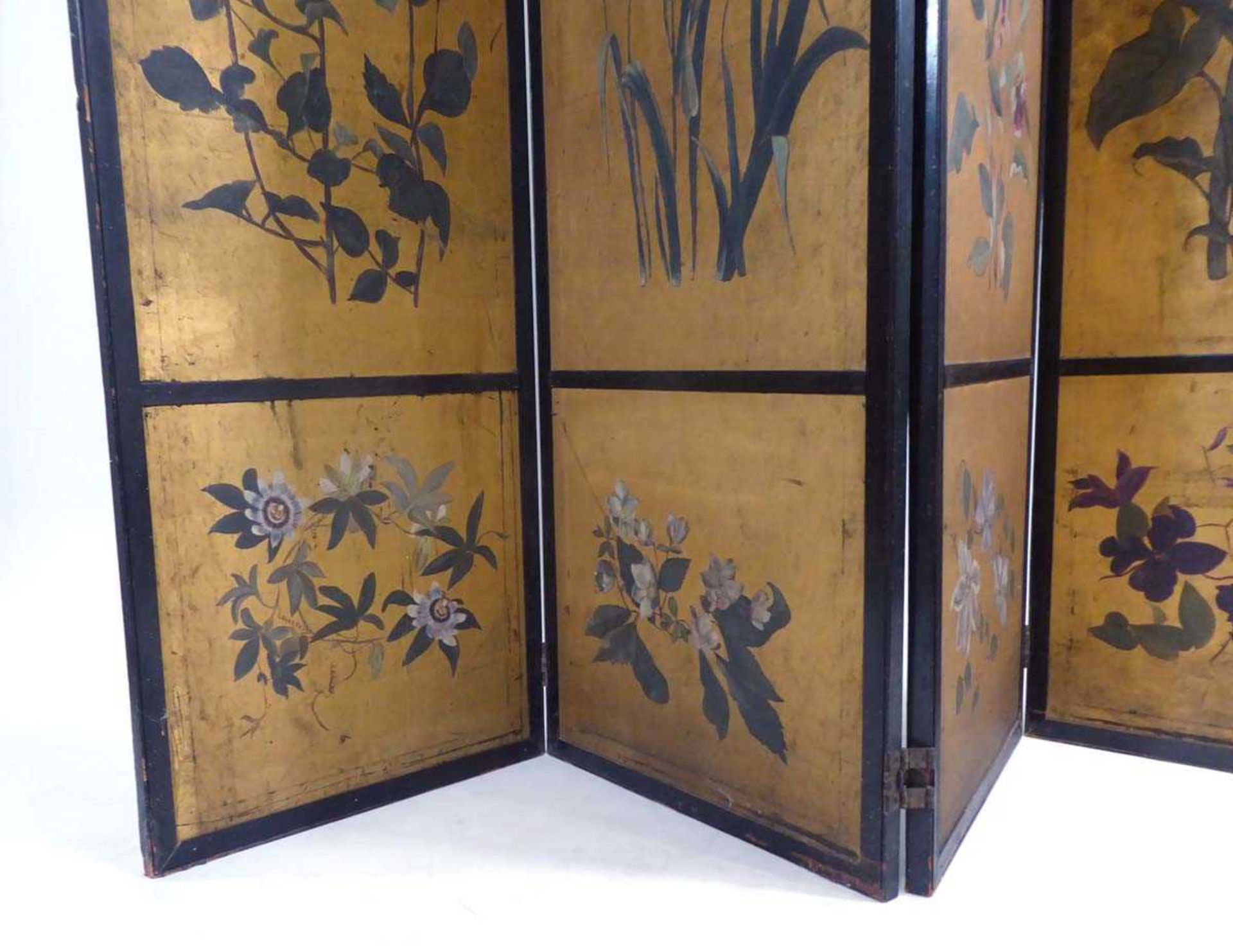 A Japanese four section screen, each panel gilt decorated with floral sprays within a black - Image 4 of 21