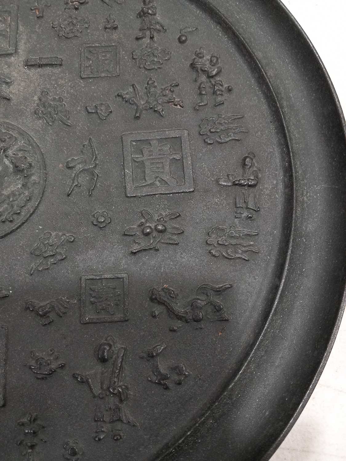 A Chinese Export cast metal 'mirror', relief decorated with figures and characters, d. 40.5 cm, - Image 16 of 25