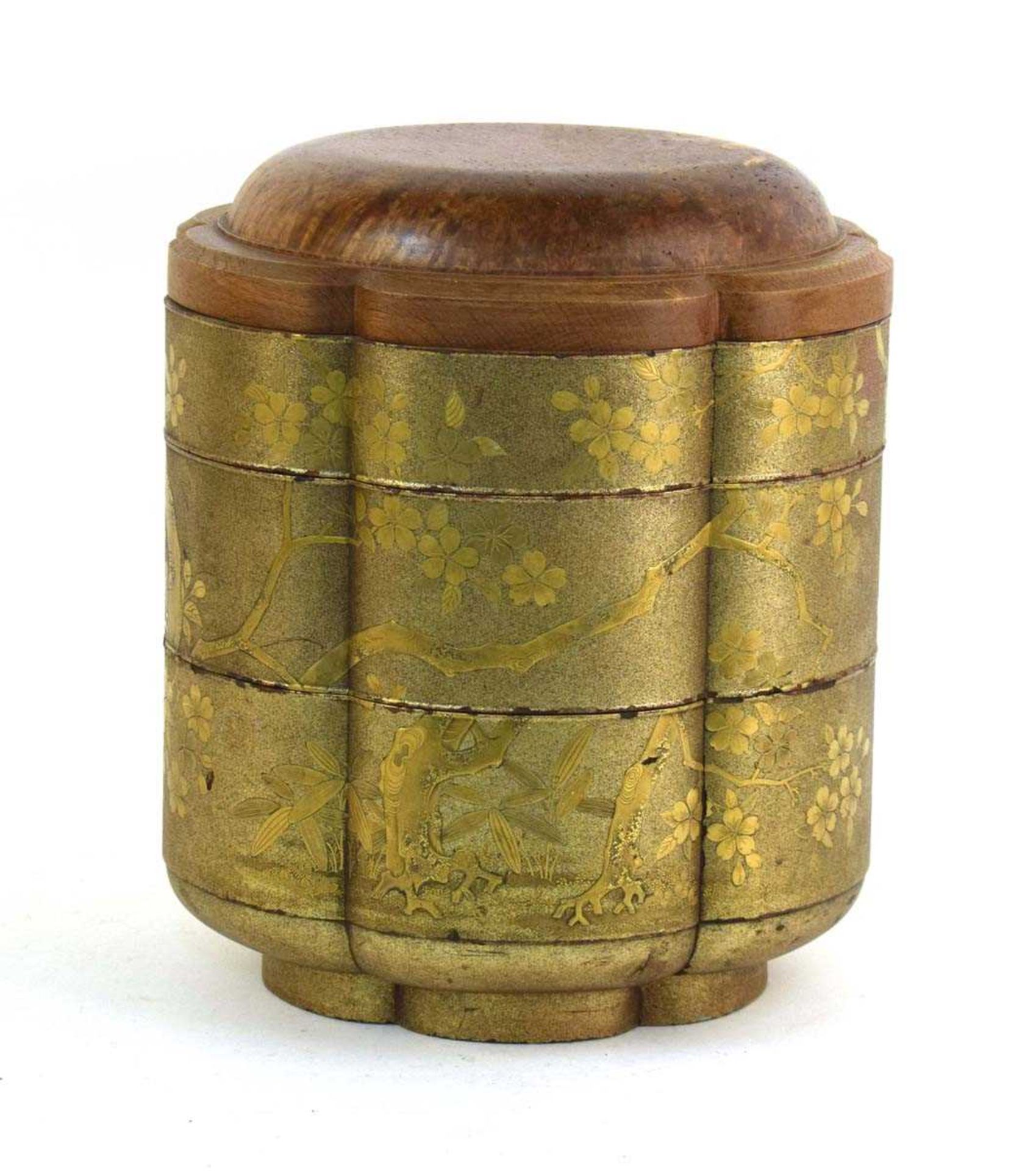 A Japanese three stage lacquer work Jūbako box of flowerhead form, the later burr wood cover over