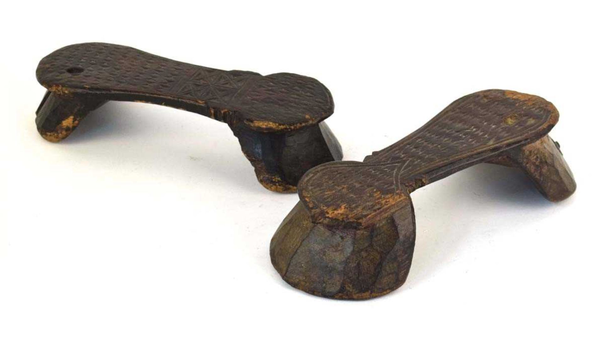 A near pair of carved wood sandals, probably Pakistani, l. 29 cm (2) *from the collection of Phillip