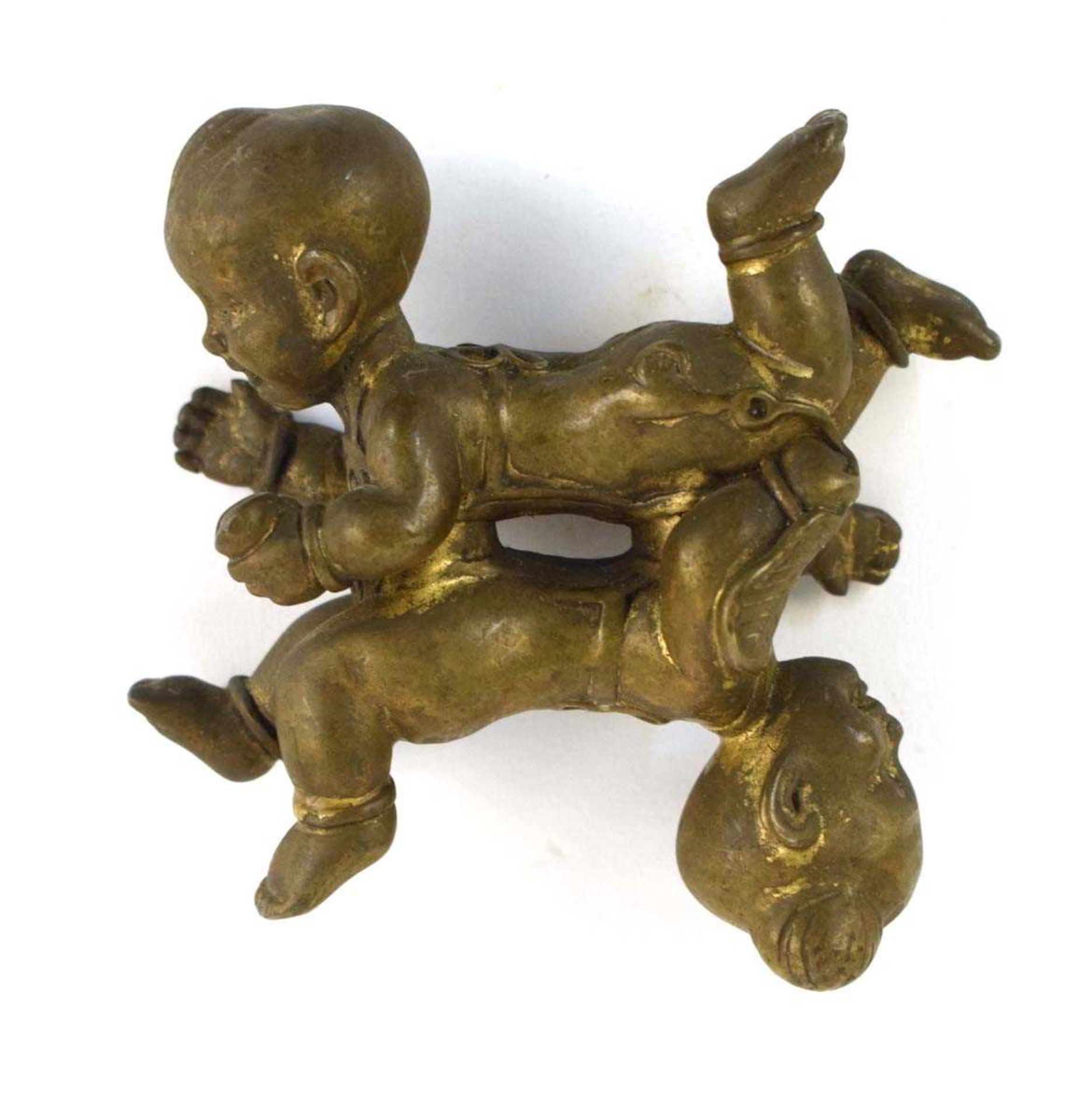 A Chinese parcel gilt bronze figure modelled as Sixi boys, approx. 4 x 11 cm, 824 gms *from the