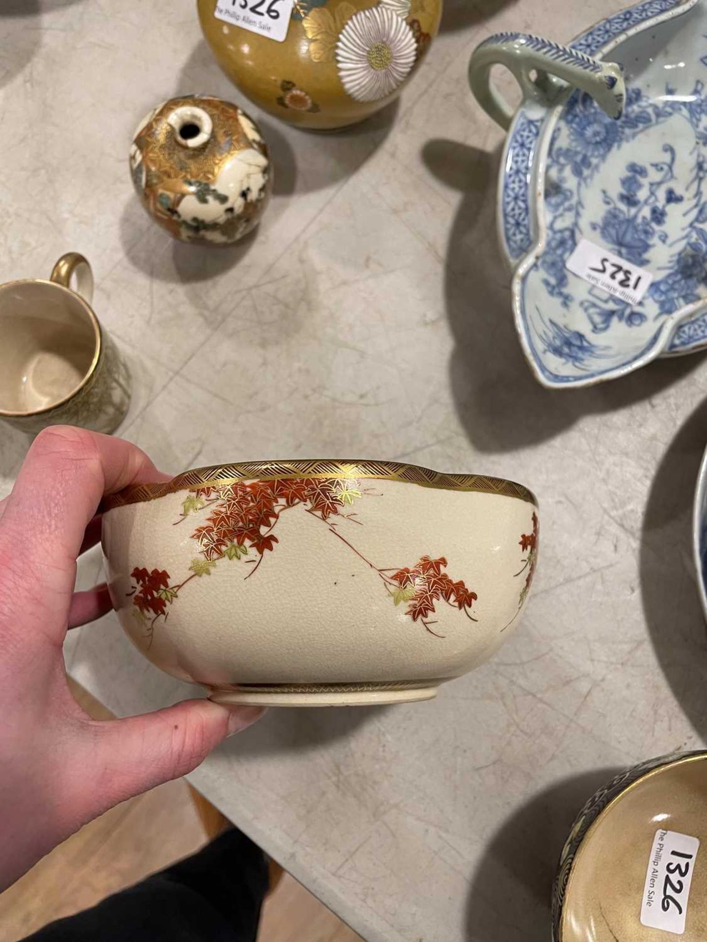 A Japanese satsuma bowl of flowerhead form, centrally decorated with peacocks within a landscape, - Image 33 of 41