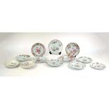 Twelve Chinese and Chinese inspired famille rouge cabinet plates, max d. 23 cm (12) *from the