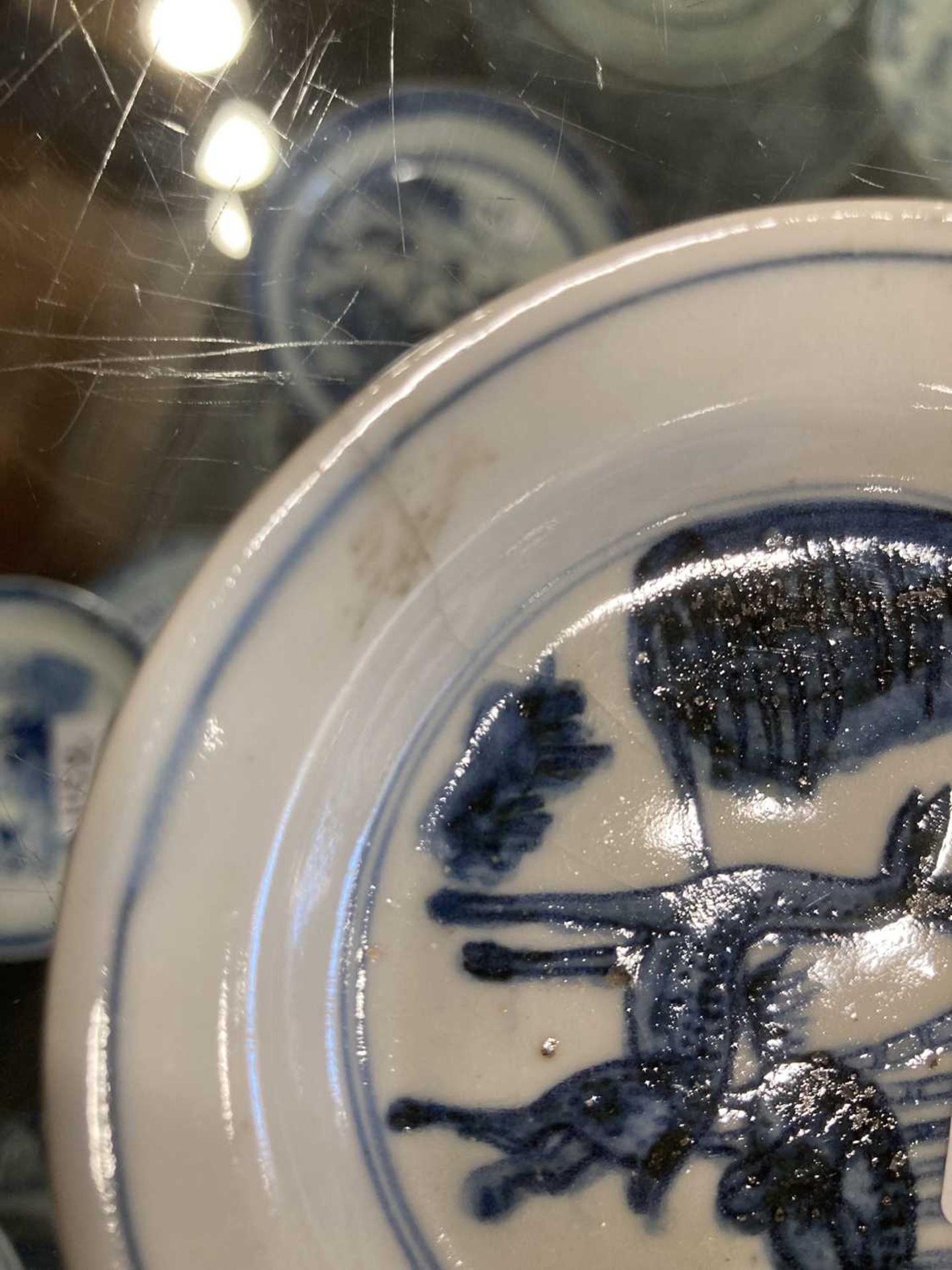 A Chinese Ming Dynasty blue and white dish centrally decorated with a pair of deer, d. 10 cm, - Bild 11 aus 14