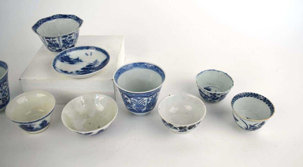 Twelve 18th century and later Chinese blue and tea bowls, cups etc., including a pair of cups - Image 4 of 14