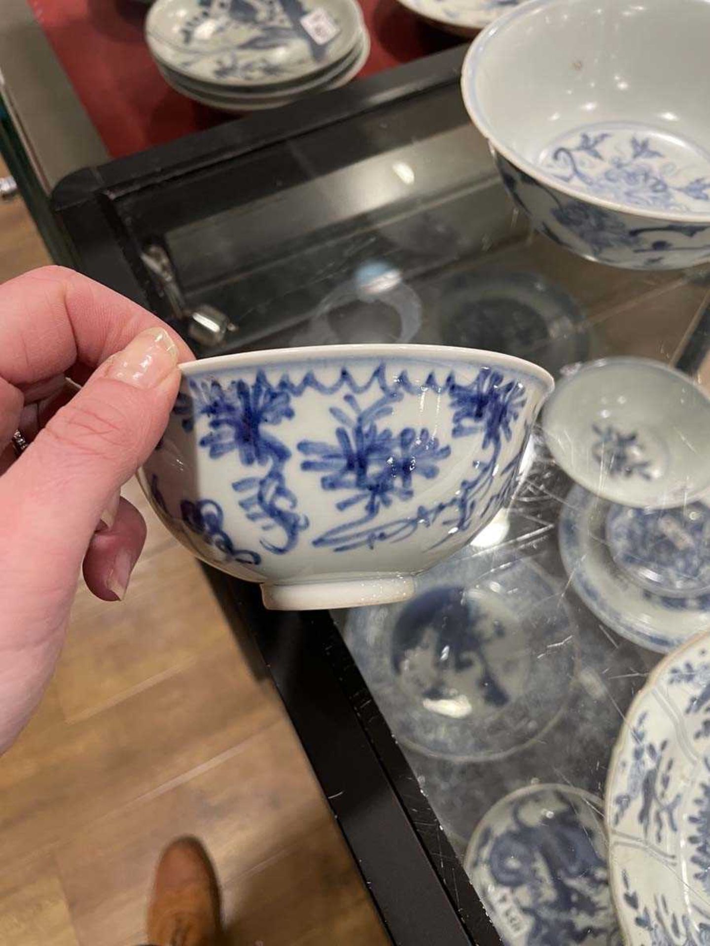 A Chinese blue and white bowl of flared form, externally decorated with scrolls of stylised - Image 18 of 22