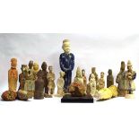 Twenty-three Chinese pottery tomb and other figures of varying sizes, including a mounted mask, l.