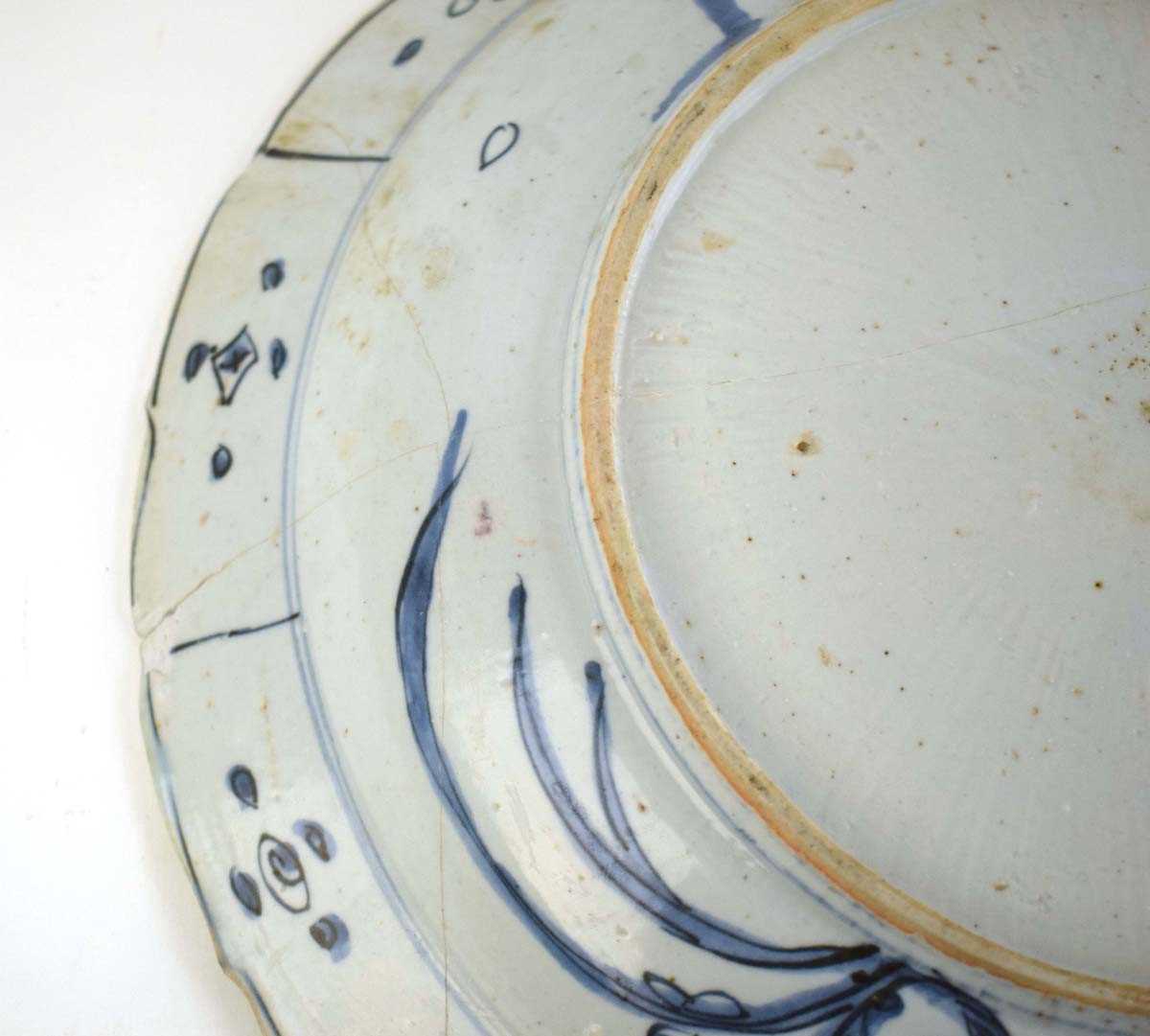A Chinese blue and white shallow bowl of flowerhead form decorated with birds within foliate - Image 8 of 10