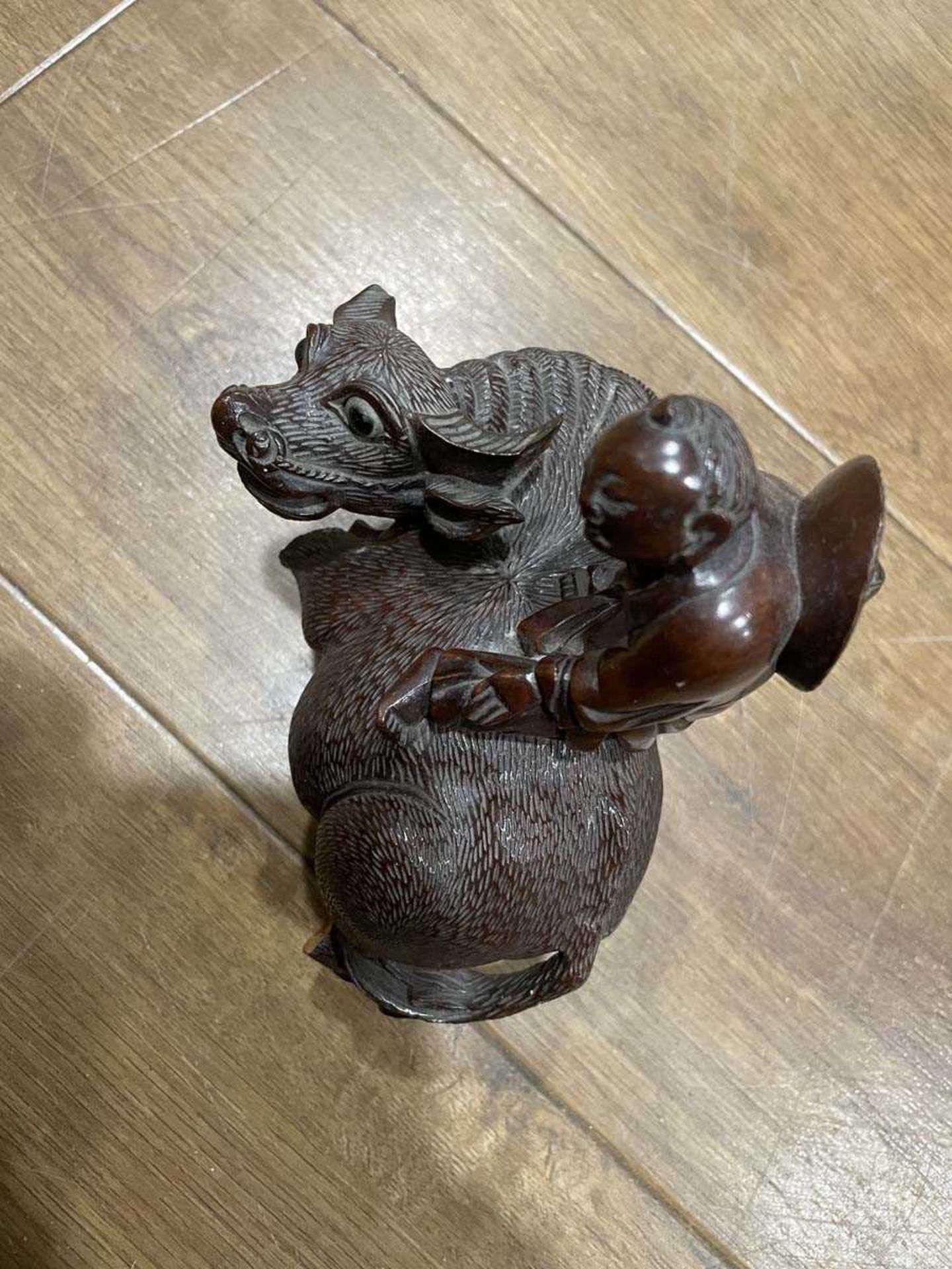 A Chinese carved hardwood figure modelled as a water buffalo and its riders, h. 17.5 cm, together - Bild 12 aus 27