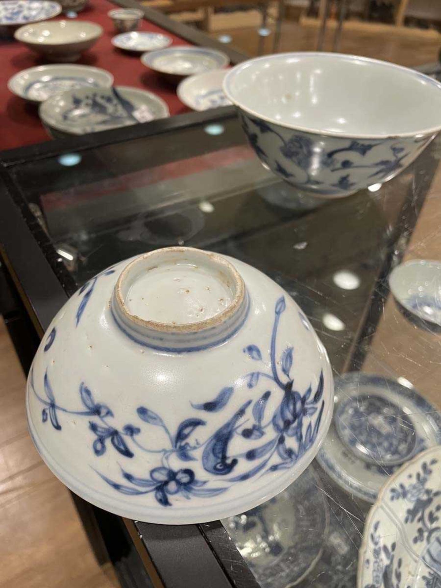 A Chinese blue and white bowl of flared form, externally decorated with scrolls of stylised - Image 13 of 22