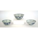 A Chinese blue and white bowl of flared form, externally decorated with scrolls of stylised