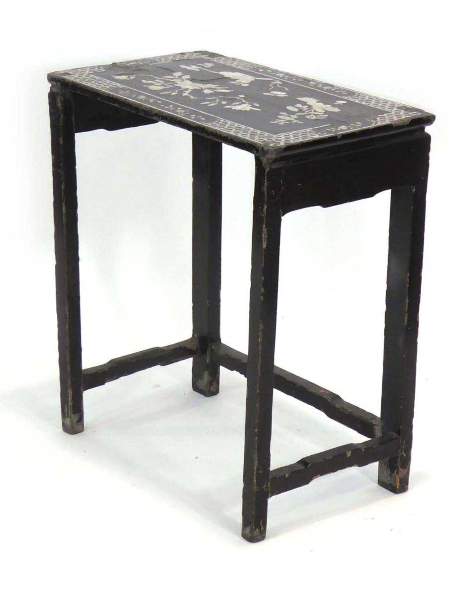 A 19th century Chinese Export (?)huanghuali and lacquered nesting table inlaid with mother-of-