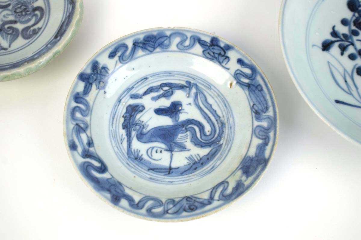 A Chinese blue and white shallow bowl of flowerhead form decorated with birds within foliate - Image 4 of 10