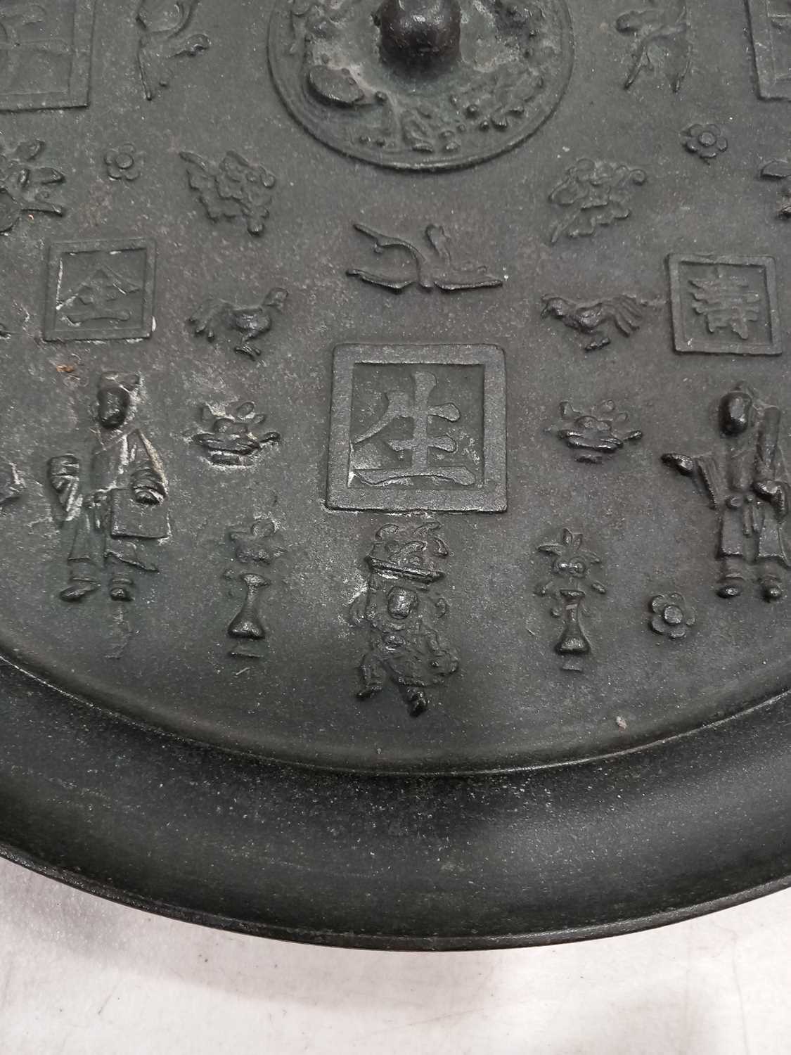 A Chinese Export cast metal 'mirror', relief decorated with figures and characters, d. 40.5 cm, - Image 17 of 25