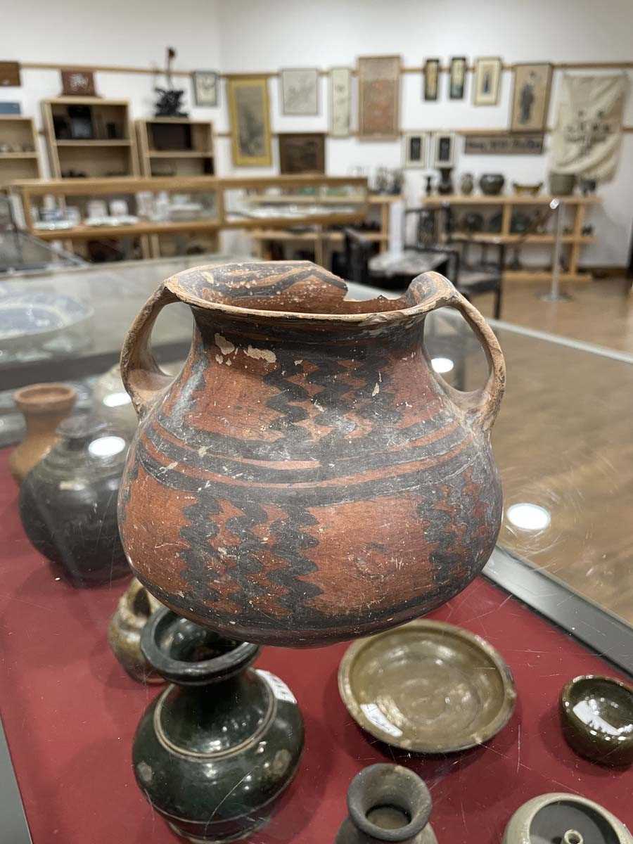 A Chinese archaic pottery two handled vase of typical form decorated in a black glaze, h. 18 cm, - Image 4 of 58