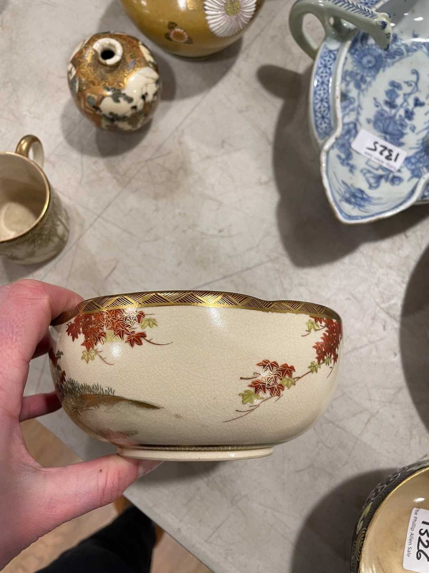 A Japanese satsuma bowl of flowerhead form, centrally decorated with peacocks within a landscape, - Image 32 of 41