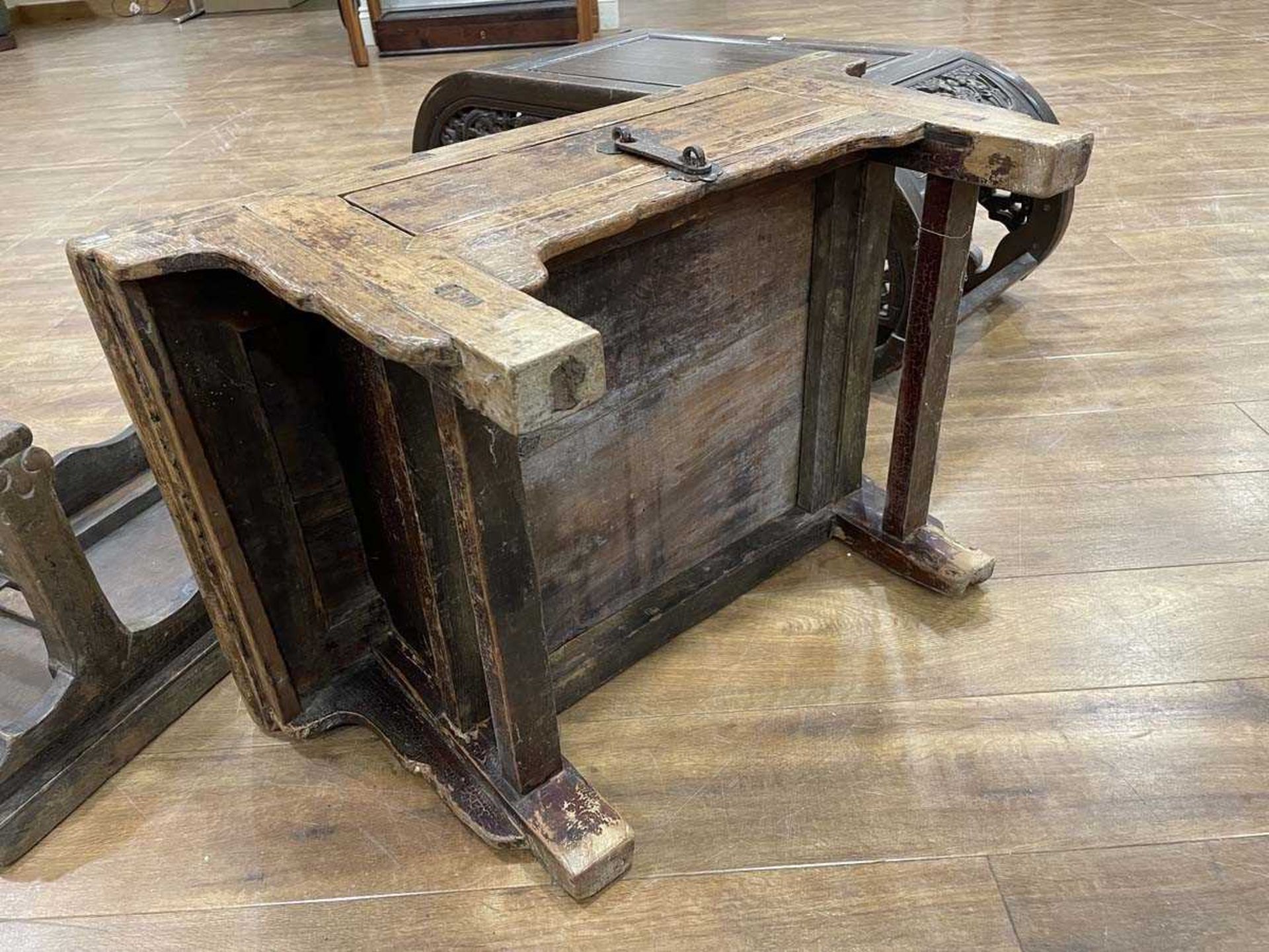 A Chinese low elm side table, the surface over a frieze on four shaped legs, 64 x 35 x 31 cm, - Bild 15 aus 15