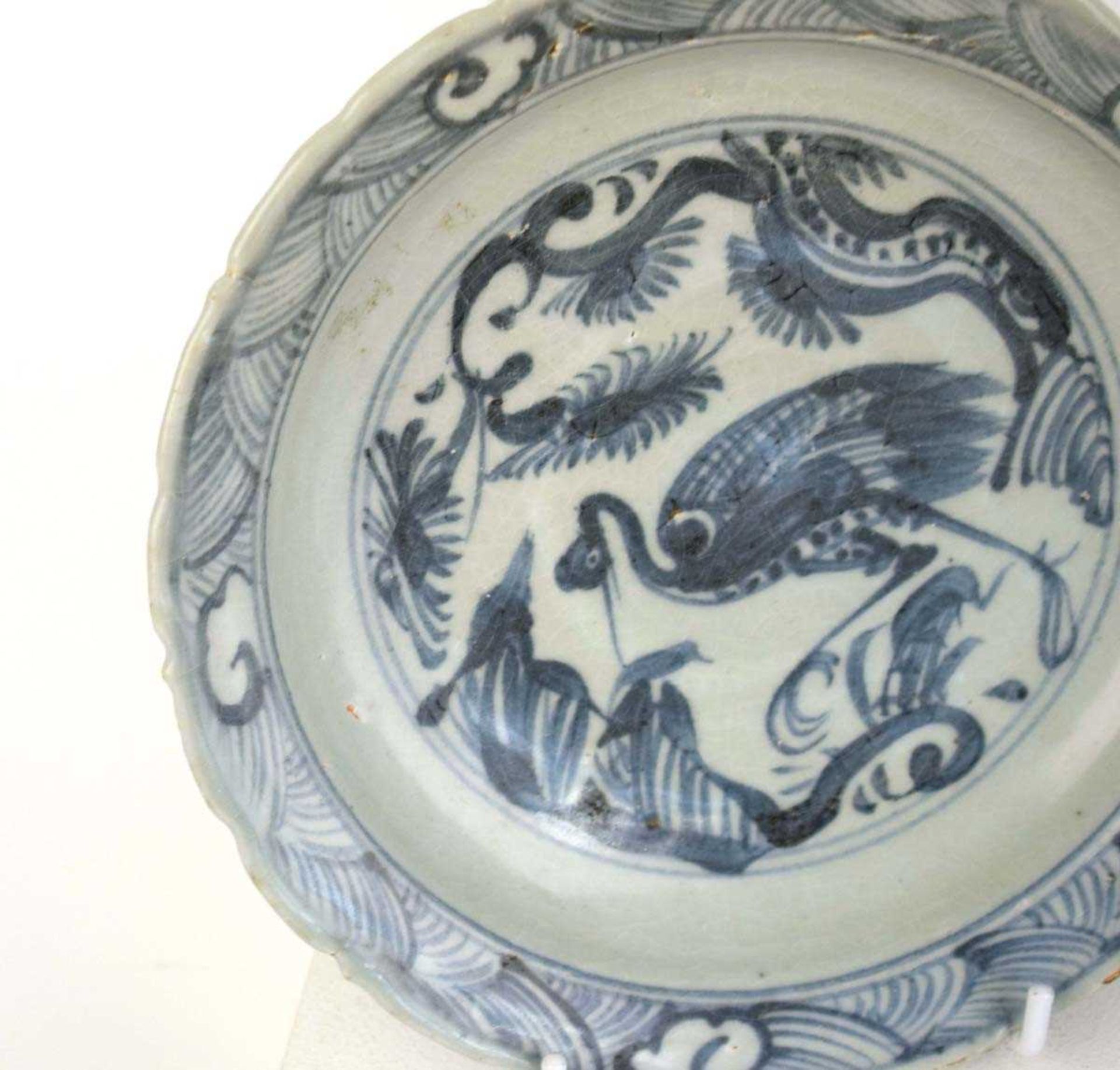A Chinese blue and white shallow bowl of flowerhead form decorated with birds within foliate - Image 3 of 10