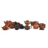 Thirteen Yixing teapots including a double chamber example, h. 10 cm, w. 21 cm, d. 8 cm, various