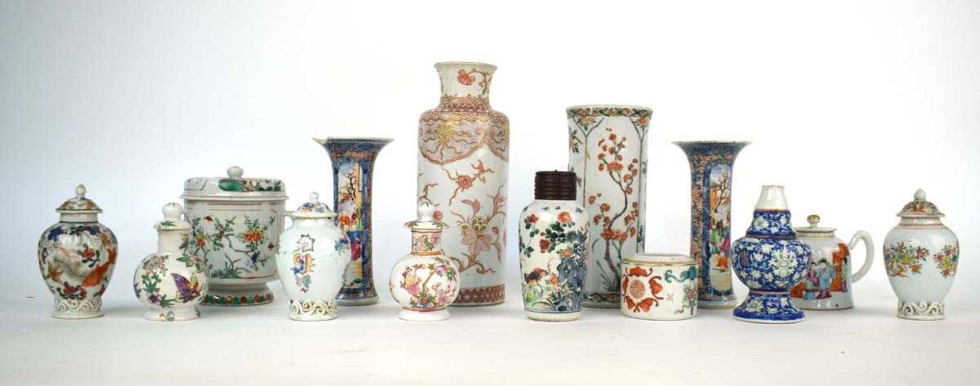 A group of Chinese Export and other ceramic jars and vases, including a miniature teapot, h. 10 cm